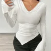 asymmetrical-hem-long-sleeve-fitted-top